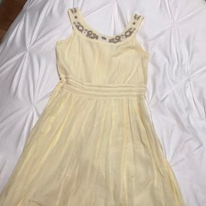 Yellow dress with embroidery details
